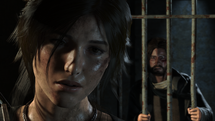 Lara Croft and man behind bars in Rise of the Tomb Raider