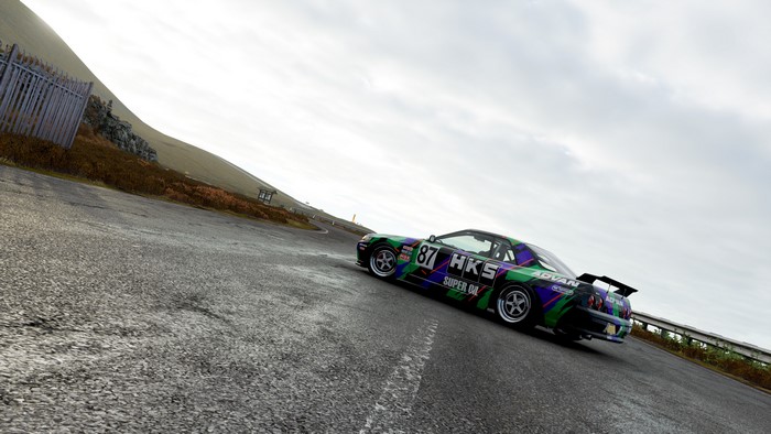 Nissan Skyline R32 HKS JDM car on a road