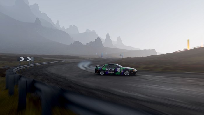 Nissan Skyline R32 drifting on a foggy road