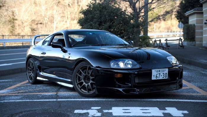 Black Toyota Supra MK4 Sports Car Outdoors