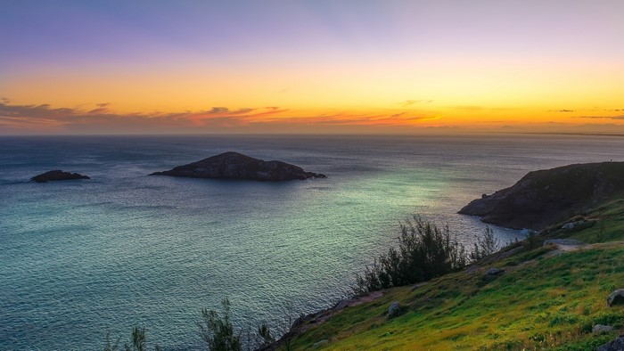 Islands in the ocean at sunset near Rio de Janeiro, Brazil