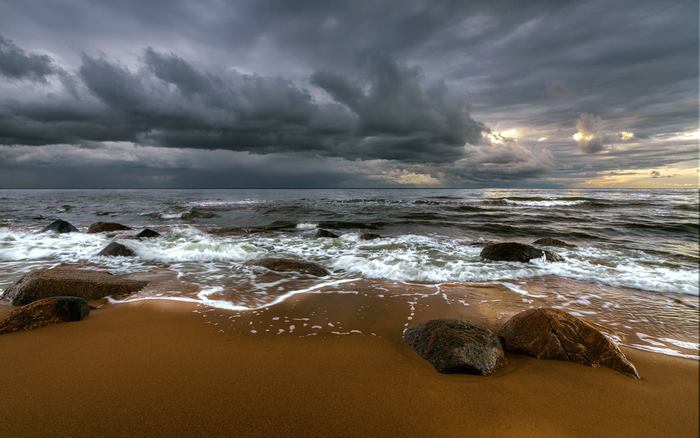 Storm over the Baltic Sea in Latvia with rocks
