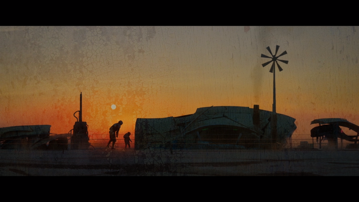 The Mandalorian in a desolate landscape