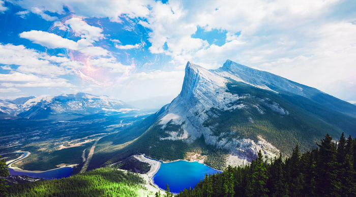 Futuristic mountain landscape with lakes and sky