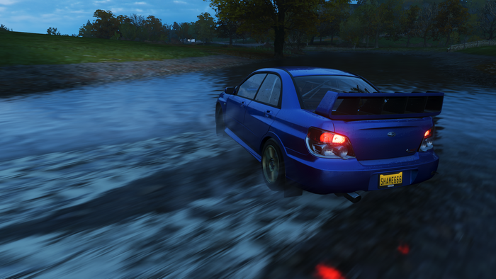 Blue Subaru Impreza WRX STI driving through water in Forza Horizon 4
