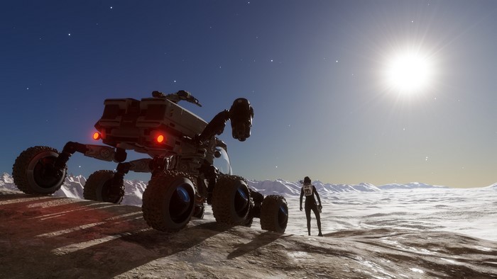 Astronaut and rover on a desolate planet