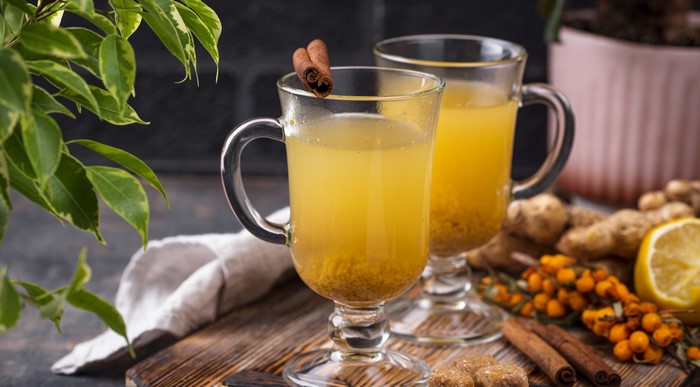 Hot drink with cinnamon, ginger, and sea buckthorn