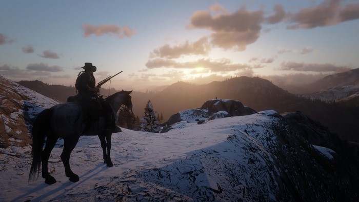 Cowboy on a horse in Red Dead Redemption 2 at sunrise