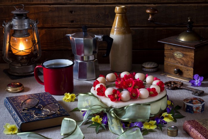 Still life with cake, coffee, and vintage items