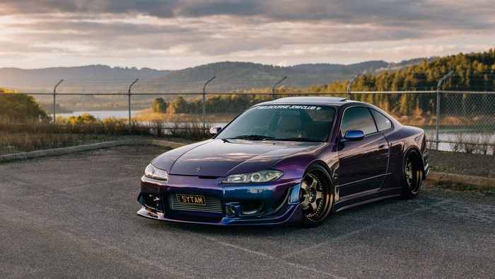 Purple Nissan Silvia S15 sports car parked outdoors