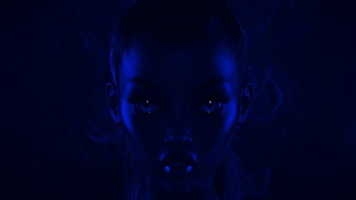 Digital art of a woman's face in blue light