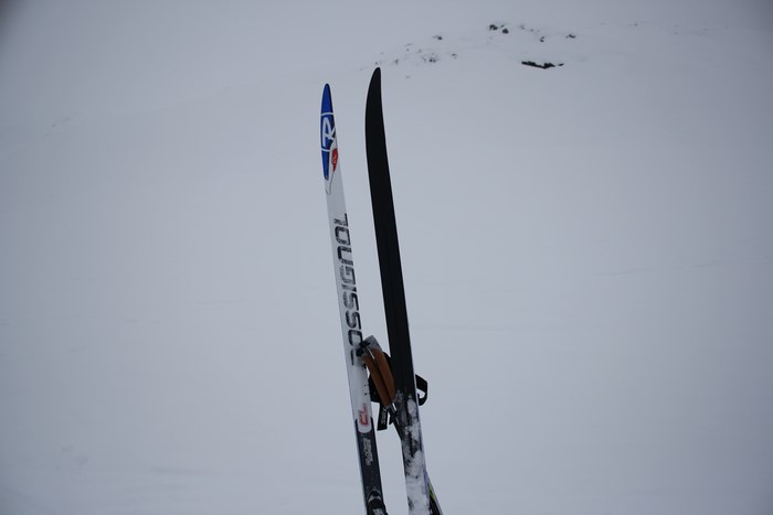 Rossignol skis and poles in snow