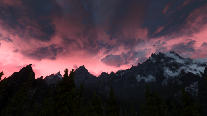 The Elder Scrolls V: Skyrim Remastered sunset over mountains