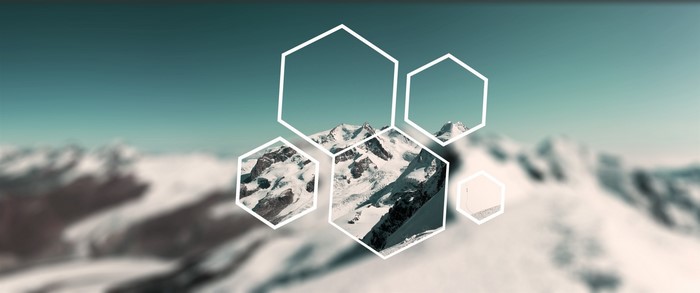 Hexagons overlaying snowy mountain landscape