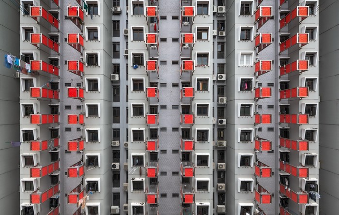 Apartment building with red balconies in Singapore