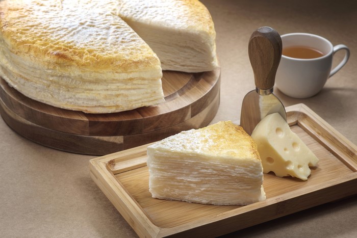 Mille Crepe cake with cheese and tea