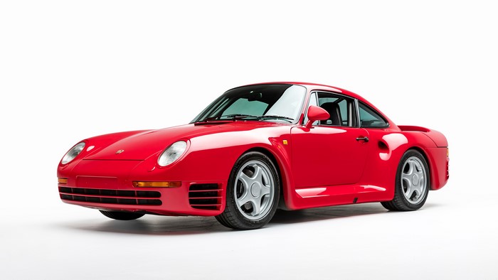 Red Porsche 959 Sports Car on White Background