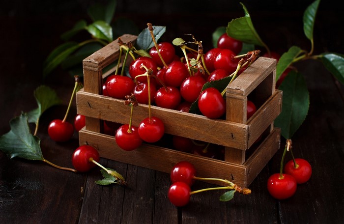 Cherries in a wooden crate