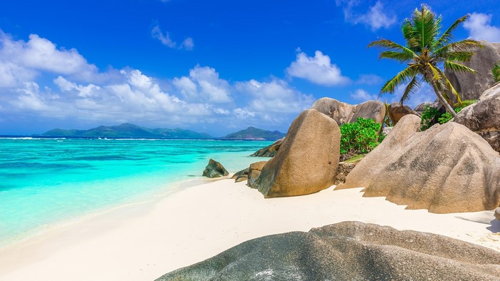 Tropical beach with granite boulders and turquoise water