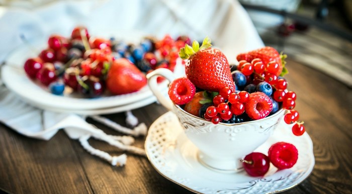 Cup of fresh berries and strawberries