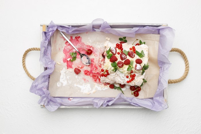 Messy Pavlova with Berries and Mint on a Tray