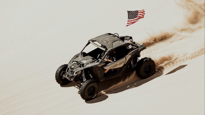 Can-Am Maverick X3 dune buggy with American flag