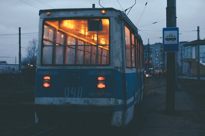 Tram 040 in a Russian city at dusk