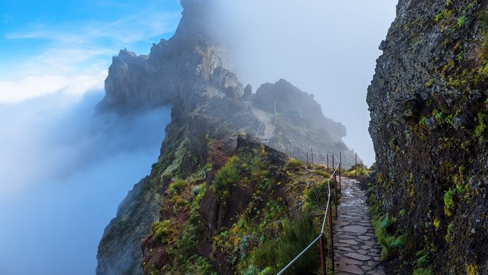 Mountain path through clouds in Madeira, Portugal