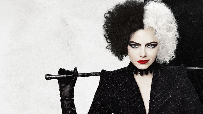 Emma Stone as Cruella de Vil with a sword