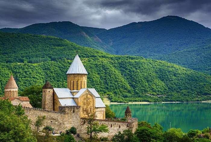 4K Monastery on a Lake with Mountains in Georgia
