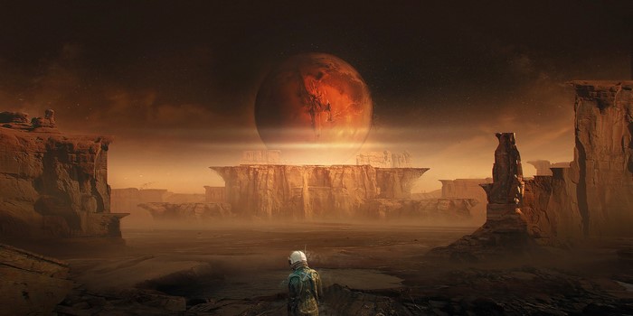 Astronaut on Mars with planet in the sky