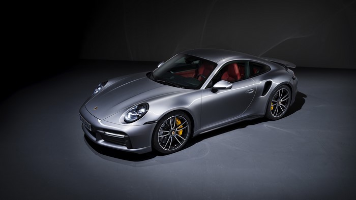 Grey Porsche 911 sports car with red interior