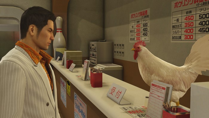 Shintaro Kazama from Yakuza 0 with a chicken