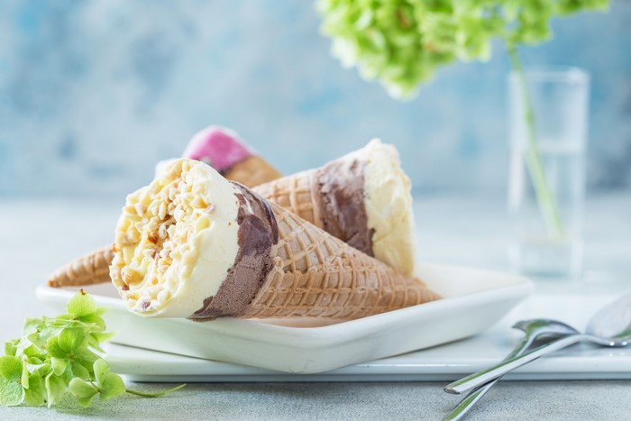 Ice cream cones on a white plate with flowers