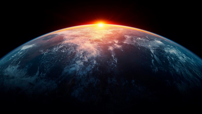 Earth from space with sunrise
