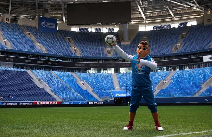 Skillzy the mascot holding a soccer ball at EURO 2020