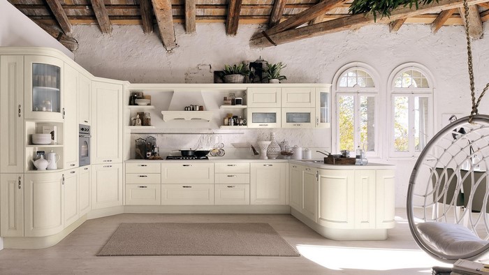 Rustic kitchen with exposed beams and hanging chair