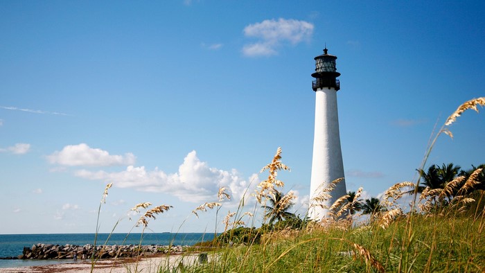 Cape Florida Lighthouse on a beach with sea oats