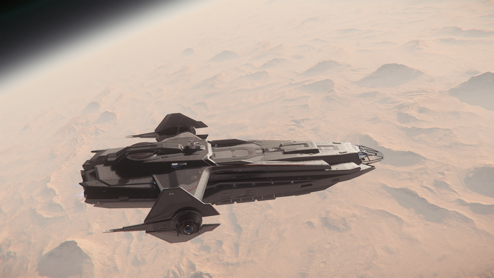Anvil Carrack spaceship flying over a desert planet in Star Citizen