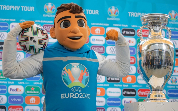 Skillzy the mascot with UEFA Euro 2020 trophy
