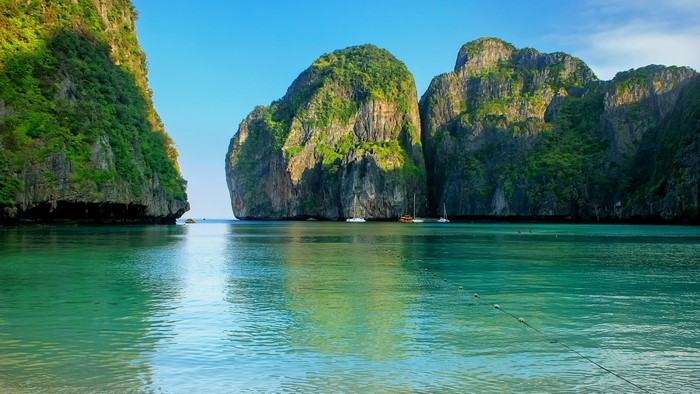 Maya Bay Thailand with Limestone Mountains and Sailboats