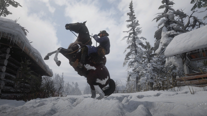Arthur Morgan from Red Dead Redemption 2 on a horse in the snow