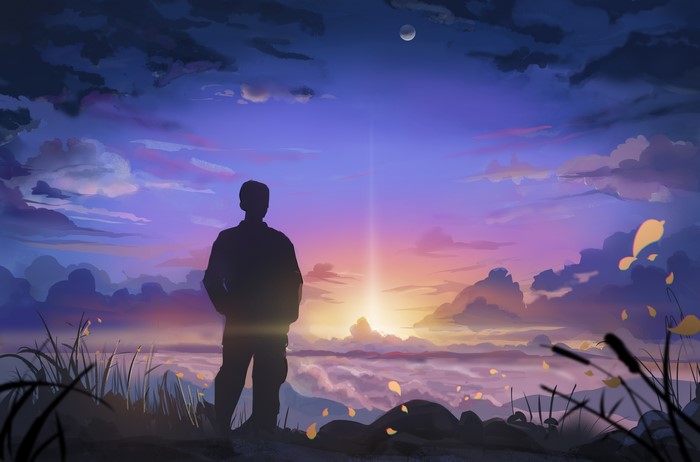 Silhouette of a man watching a sunset with clouds and moon