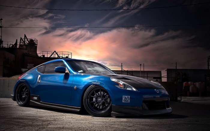 Blue Nissan 370Z with custom modifications