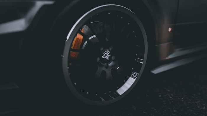 Nissan GT-R R34 wheel with orange brake caliper