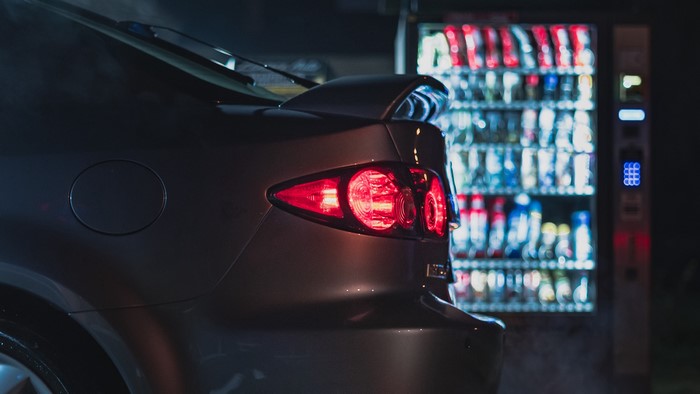4K Gray Mazda 3 Taillights and Vending Machine at Night