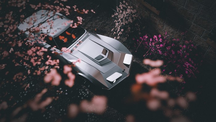 Silver Chevrolet Corvette Stingray C3 with pop-up headlights