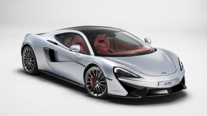 Silver McLaren 570GT sports car with red interior