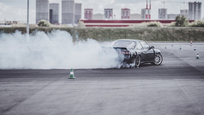 Nissan 200SX S14 drifting with smoke