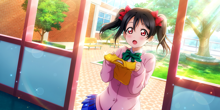 Yazawa Nico from Love Live! holding a yellow shirt